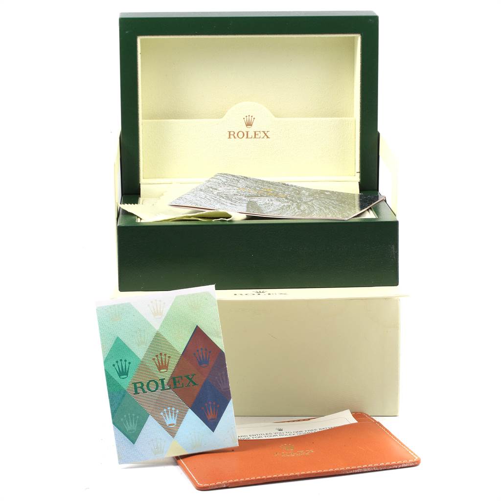The image shows the box and accessories for a Rolex Cellini 6673 Women's White Gold Silver Dial 6673 Women's White Gold Silver Dial watch, including the outer box, the green display box, manuals, and a cardholder.