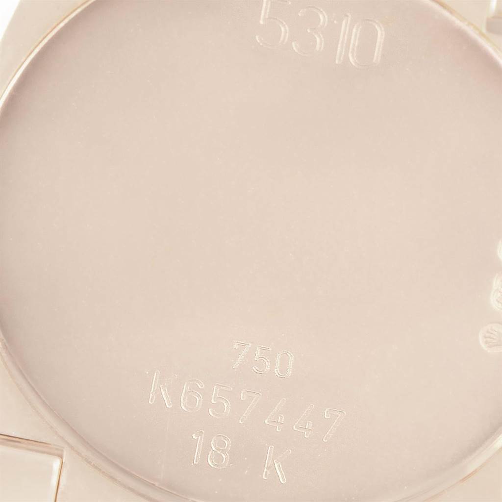 The image shows the back case of a Rolex Cellini 5310 Women's Rose Gold White Dial 5310 Women's Rose Gold White Dial watch at a close-up angle, displaying the model number and material inscriptions.