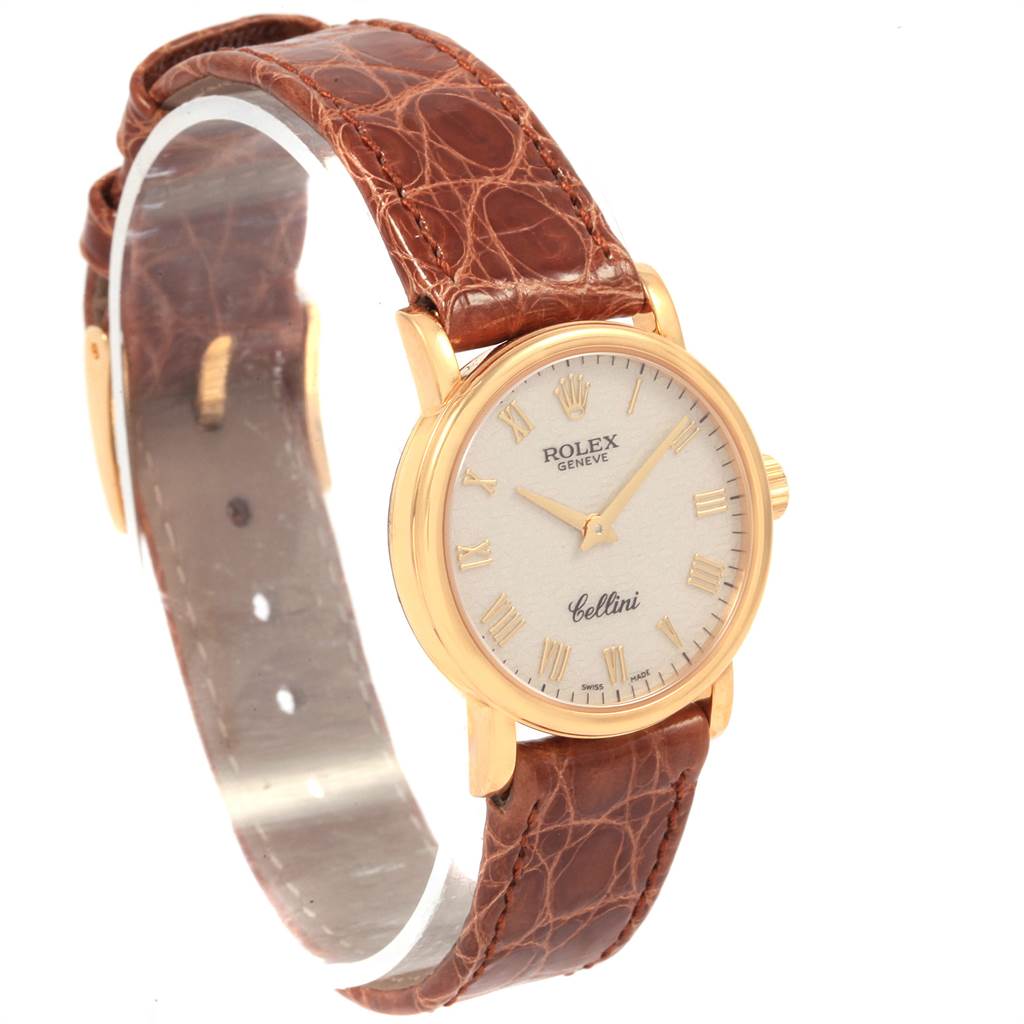 The image shows a brown leather-banded Rolex Cellini 6110 Women's Yellow Gold Beige Dial 6110 Women's Yellow Gold Beige Dial watch from a side angle, highlighting the gold case and white dial.
