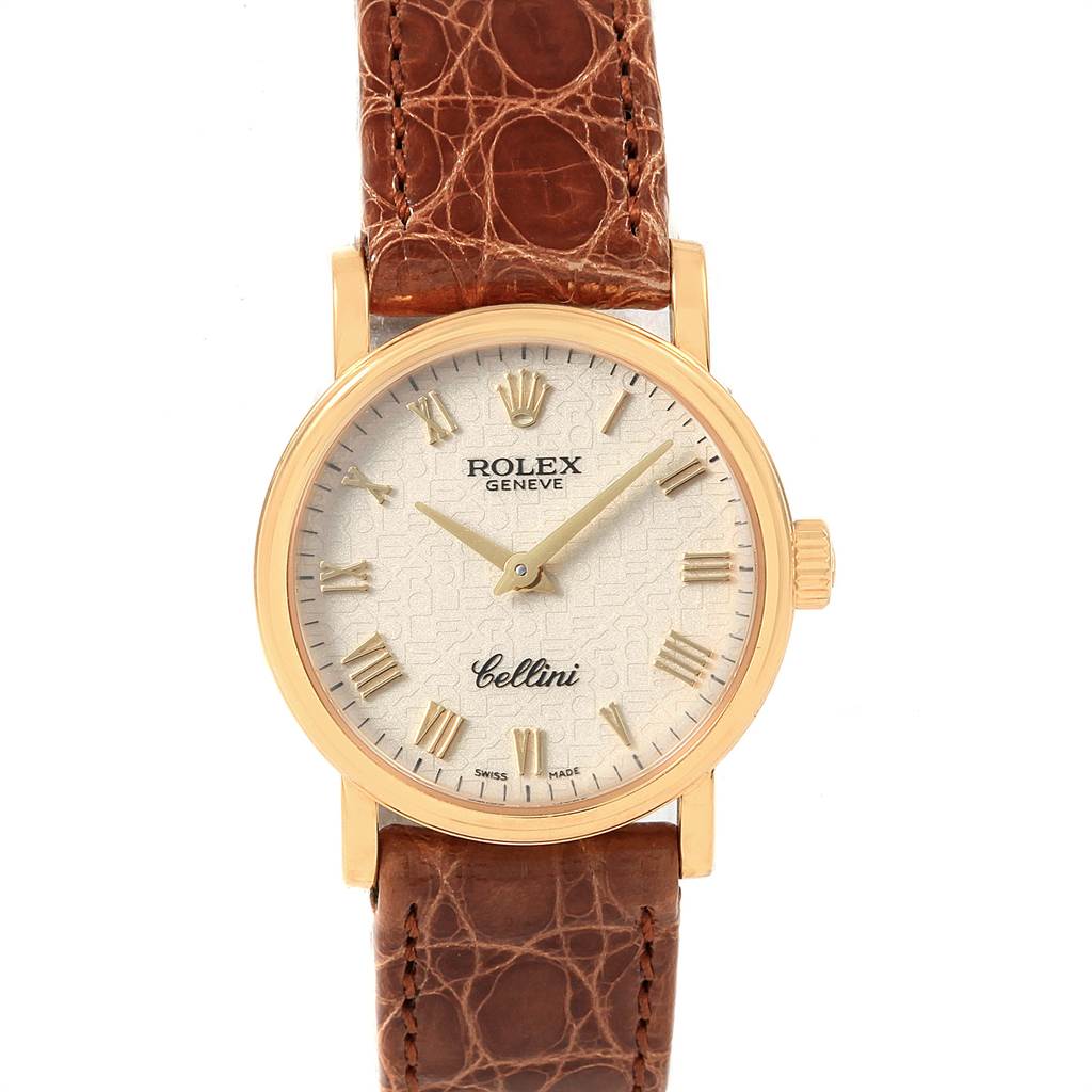 The Rolex Cellini 6110 Women's Yellow Gold Beige Dial 6110 Women's Yellow Gold Beige Dial watch is shown from the front, highlighting its dial, hands, crown, and brown leather strap.