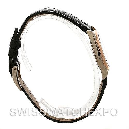 Side view of a Rolex Cellini 6229 Women's White Gold White Dial 6229 Women's White Gold White Dial watch, highlighting the case and black leather strap.