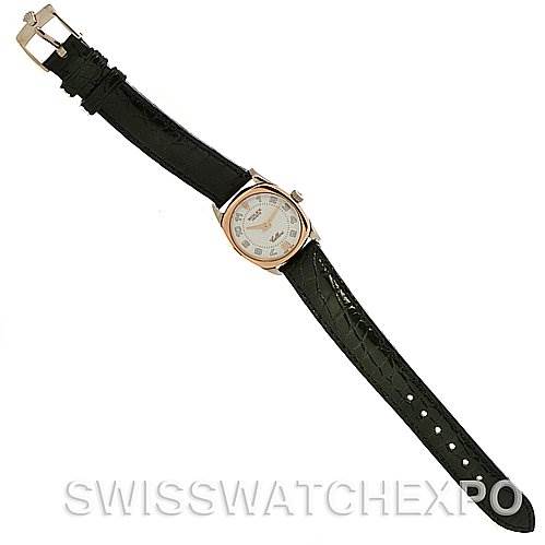 The Rolex Cellini 6229 Women's White Gold White Dial 6229 Women's White Gold White Dial watch is shown from a top-down angle, displaying the entire watch face and black leather strap.