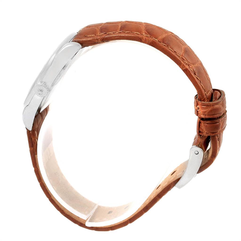 The image shows a side view of the Rolex Cellini 6229 Women's White Gold Black Dial 6229 Women's White Gold Black Dial watch, highlighting its brown leather strap and silver clasp.