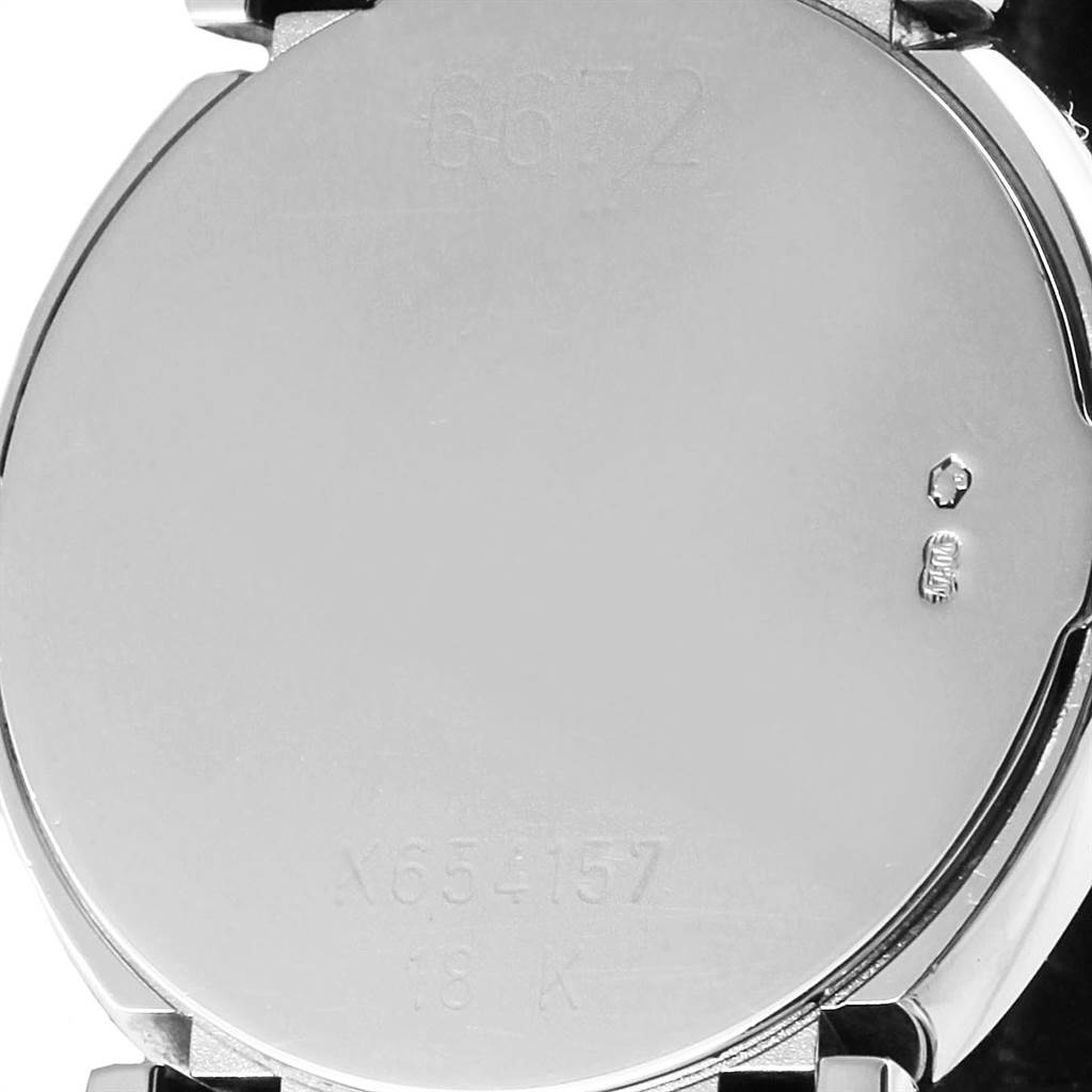 The image shows the case back of a Rolex Cellini 6672 Women's White Gold Pink Dial 6672 Women's White Gold Pink Dial watch, displaying its serial and model numbers, as well as metal hallmarks.