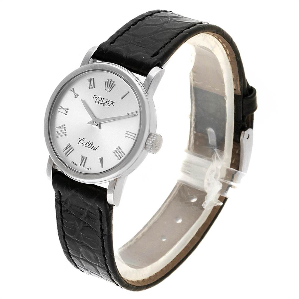 The image shows a Rolex Cellini 6110 Women
s White Gold Silver Dial 6110 Women
s White Gold Silver Dial watch at a three-quarter angle, highlighting the face, dial, crown, and leather strap.