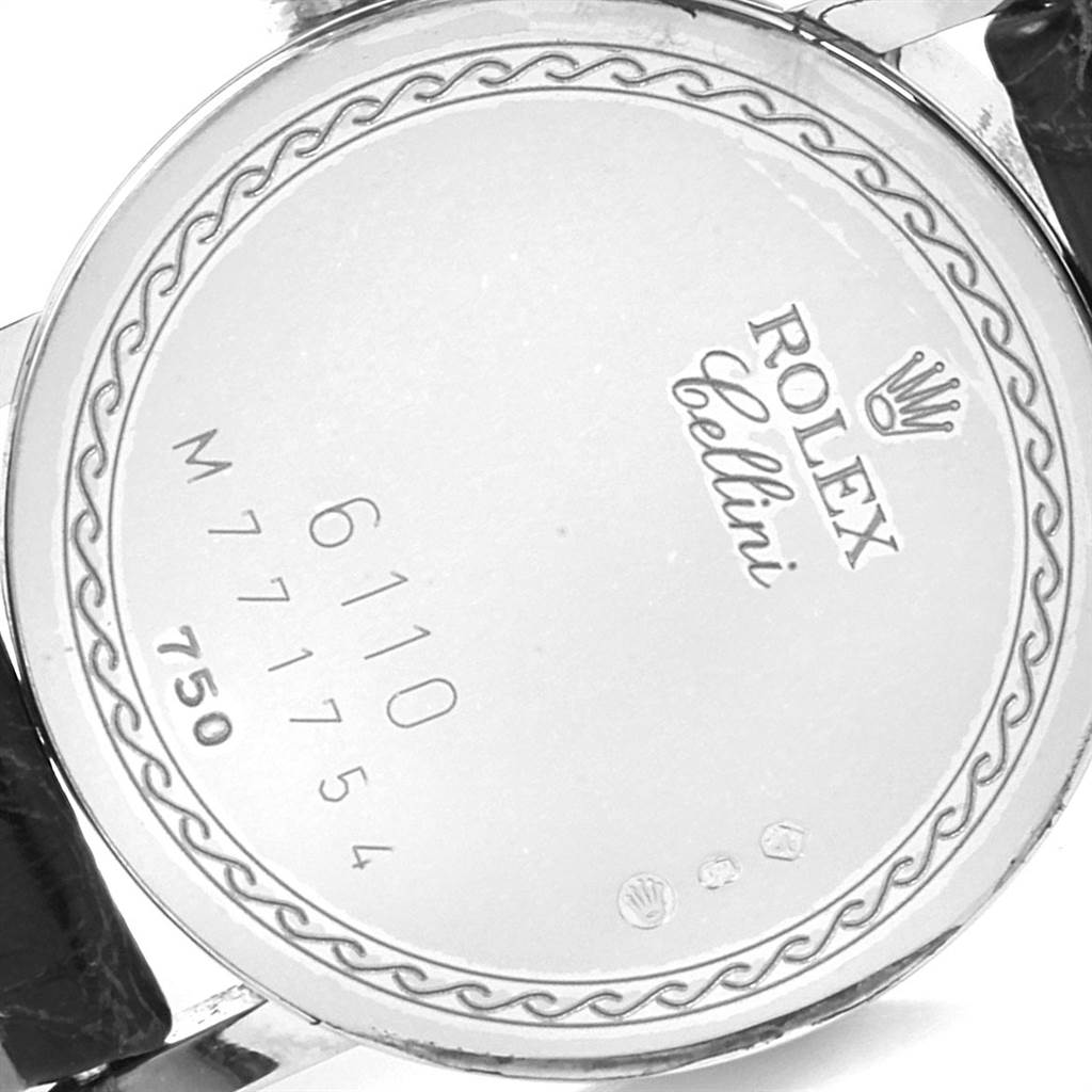 This image shows the back casing of a Rolex Cellini 6110 Women
s White Gold Silver Dial 6110 Women
s White Gold Silver Dial watch, displaying model and serial numbers.