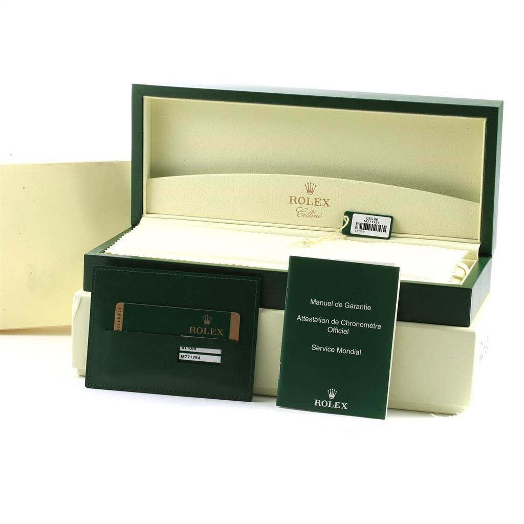 The image shows the open box and documentation accessories for a Rolex Cellini 6110 Women
s White Gold Silver Dial 6110 Women
s White Gold Silver Dial model watch.