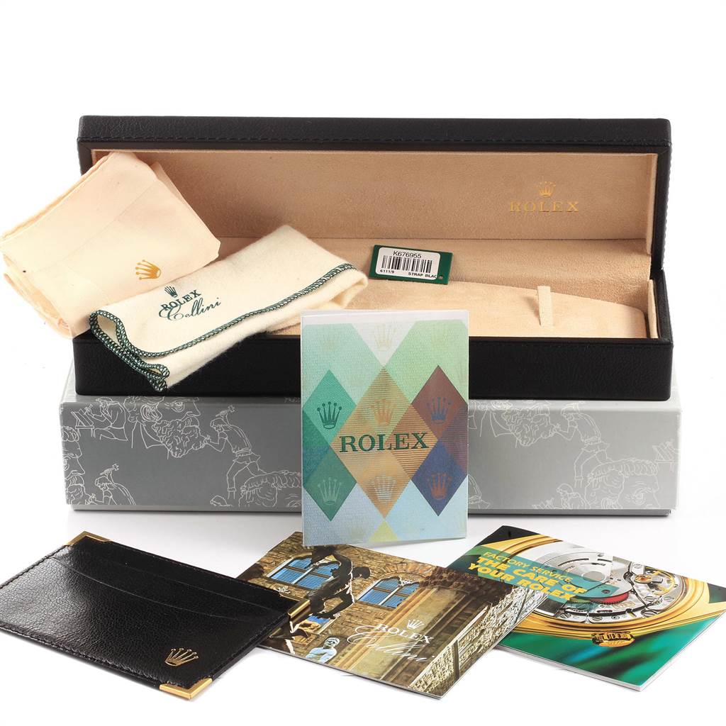 This image shows the packaging and accessories of a Rolex Cellini 6111 Women
s White Gold Silver Dial 6111 Women
s White Gold Silver Dial watch, including a box, cloths, and manuals from a front angle.