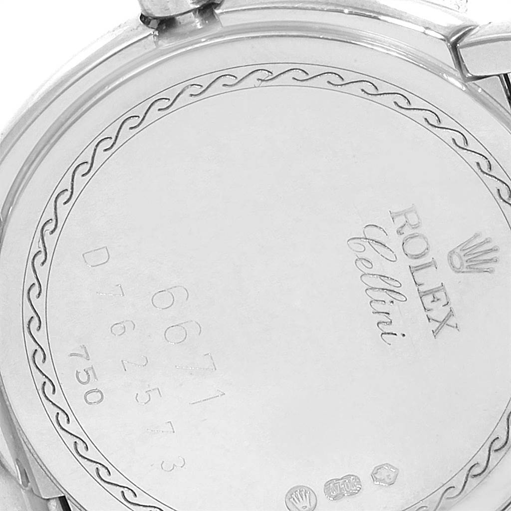 The image shows the back case of a Rolex Cellini 6671 Women's White Gold Pink Dial 6671 Women's White Gold Pink Dial watch, displaying the brand name, model name, and serial numbers.