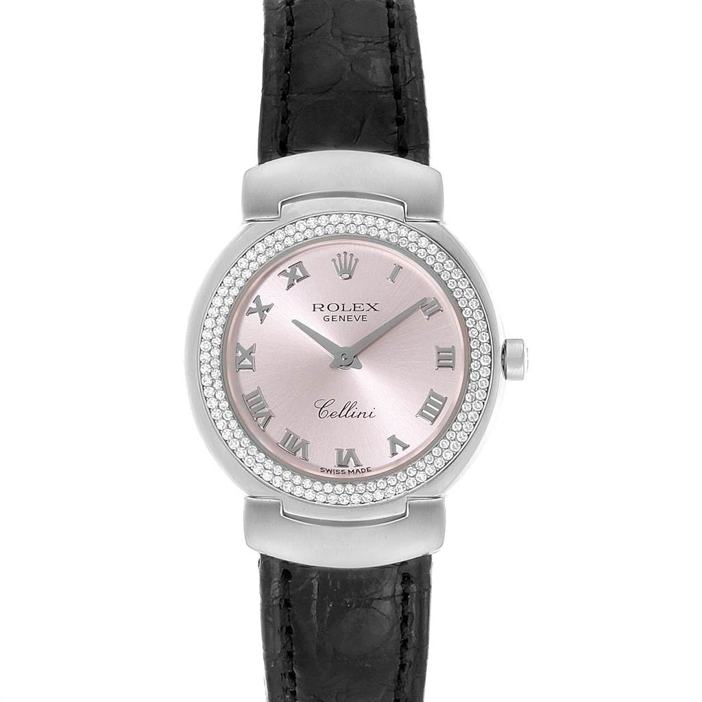 The image shows a frontal view of a Rolex Cellini 6671 Women's White Gold Pink Dial 6671 Women's White Gold Pink Dial watch with a pink dial, Roman numerals, and a black leather strap.
