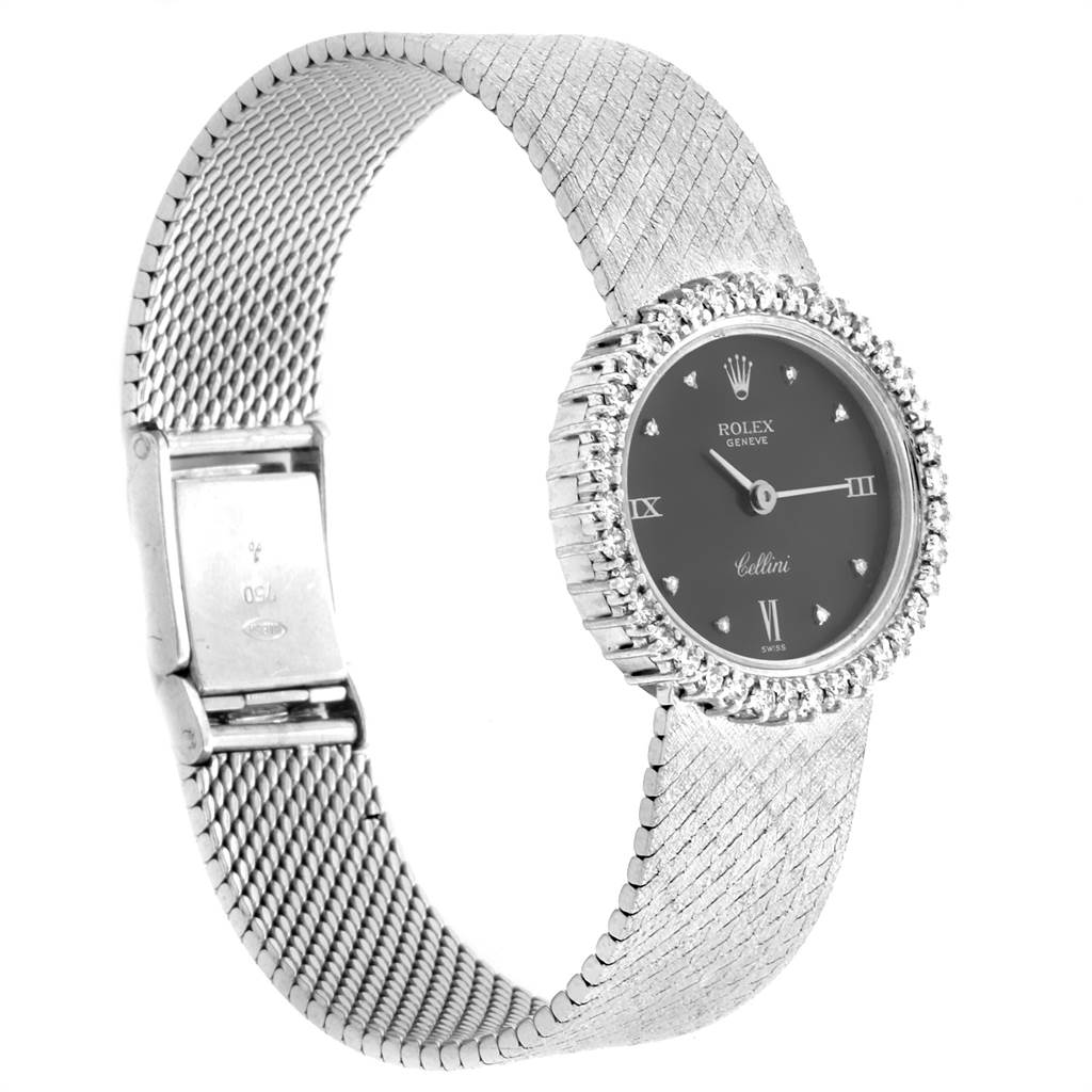 The Rolex Cellini 6673 Women
s White Gold Grey Dial 6673 Women
s White Gold Grey Dial watch is shown at an angle displaying its face, bezel, mesh bracelet, and clasp.