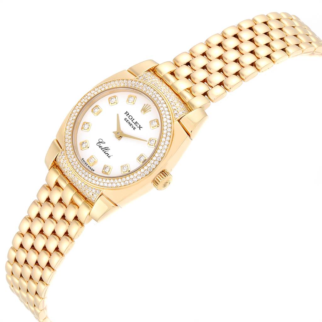 The Rolex Cellini 6311 Women's Yellow Gold White Dial 6311 Women's Yellow Gold White Dial watch is shown from a top angle, featuring a gold bracelet, diamond bezel, and white dial with diamond hour markers.