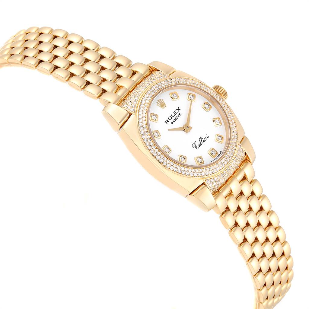 This Rolex Cellini 6311 Women's Yellow Gold White Dial 6311 Women's Yellow Gold White Dial watch is shown at a slight angle, displaying its gold bracelet, diamond-encrusted bezel, and dial.