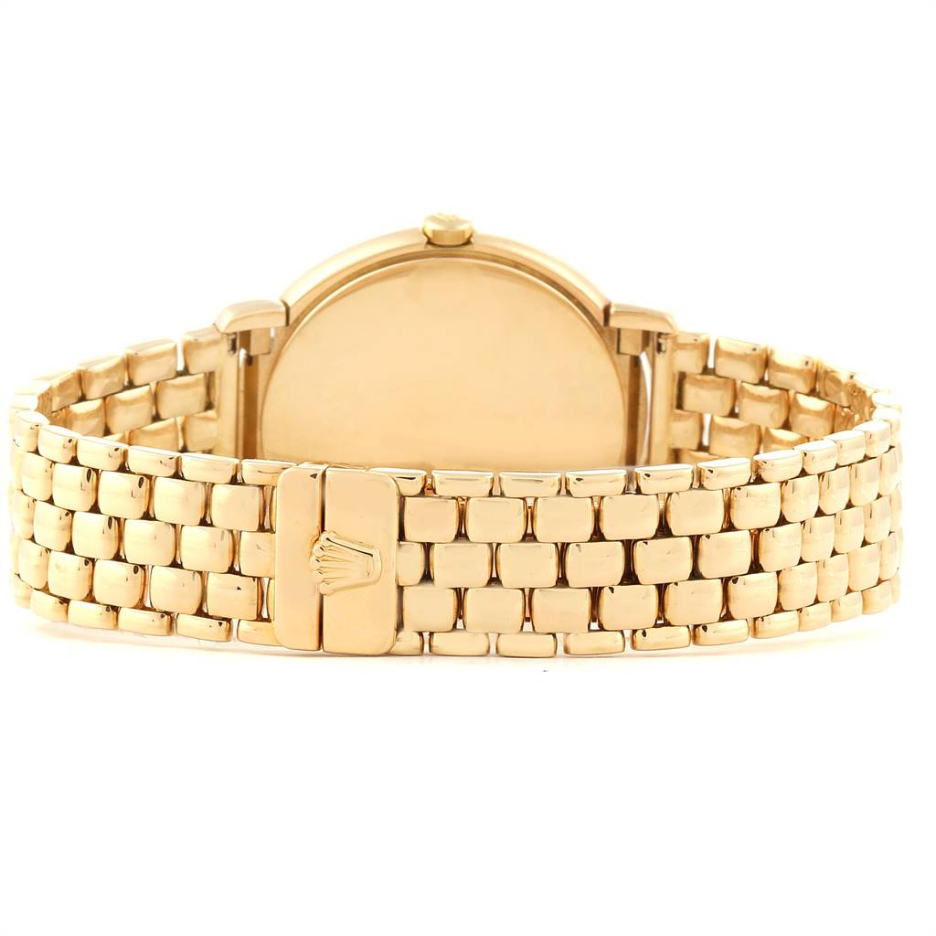 This image shows the rear view of the Rolex Cellini 6622 Women
s Yellow Gold White Dial 6622 Women
s Yellow Gold White Dial watch, focusing on the gold bracelet and clasp with the Rolex logo.