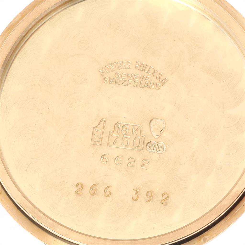 The image shows the inner case back of a Rolex Cellini 6622 Women
s Yellow Gold White Dial 6622 Women
s Yellow Gold White Dial watch, highlighting inscriptions and hallmarks.