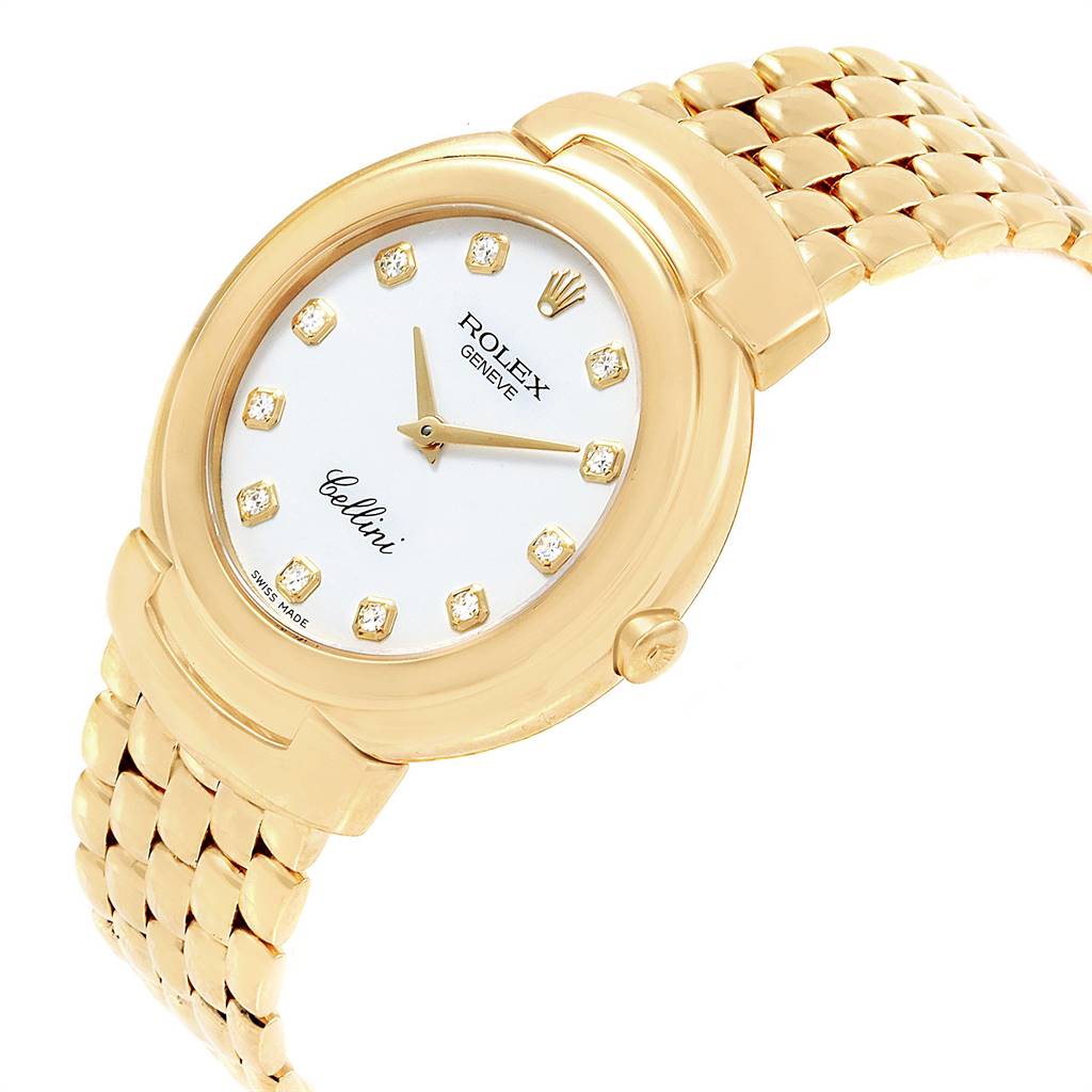 The Rolex Cellini 6622 Women
s Yellow Gold White Dial 6622 Women
s Yellow Gold White Dial watch is shown at an angled view displaying its gold case, white dial with diamond markers, and gold bracelet.