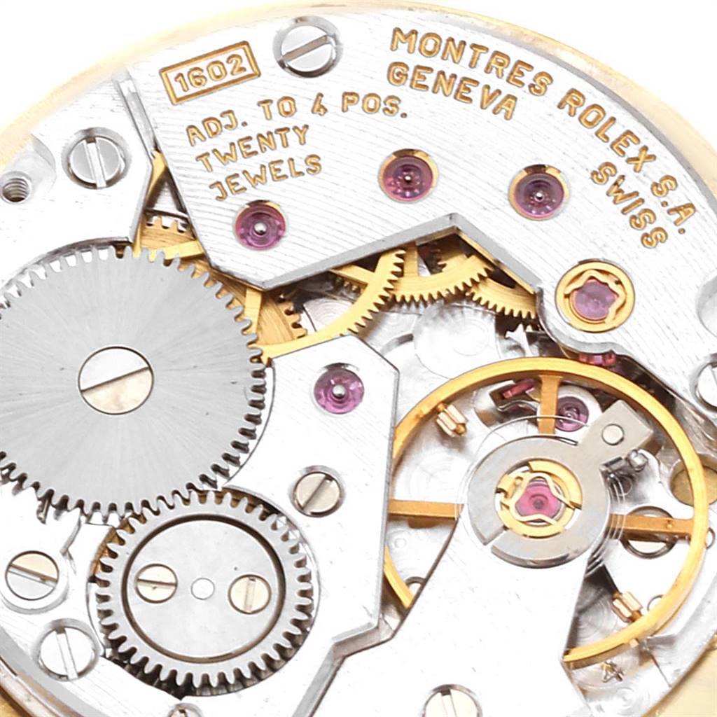 This image shows a close-up of the internal mechanical movement of the Rolex Cellini 5109 Women's Yellow Gold Champagne Dial 5109 Women's Yellow Gold Champagne Dial watch, highlighting gears and jewels.