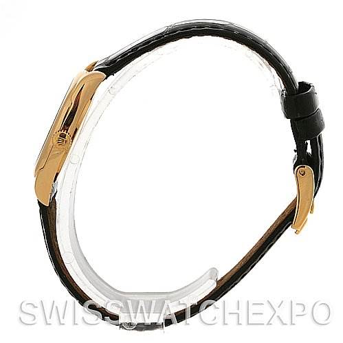 The image shows a side view of a Rolex Cellini 6229 Women's Yellow Gold White Dial 6229 Women's Yellow Gold White Dial watch, highlighting the gold case and black leather strap.