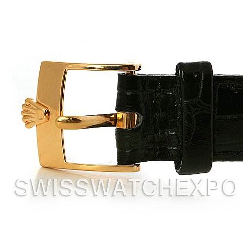 The image shows a close-up of the gold buckle and black leather strap of a Rolex Cellini 6229 Women's Yellow Gold White Dial 6229 Women's Yellow Gold White Dial watch.