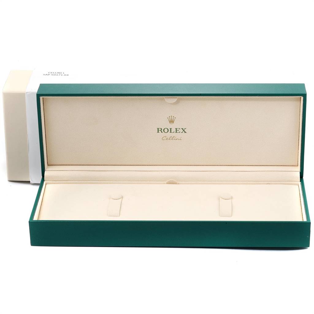 The image shows an open green Rolex Cellini 6673 Women
s White Gold Silver Dial 6673 Women
s White Gold Silver Dial watch box from a front angle, displaying the interior with slots for the watch.
