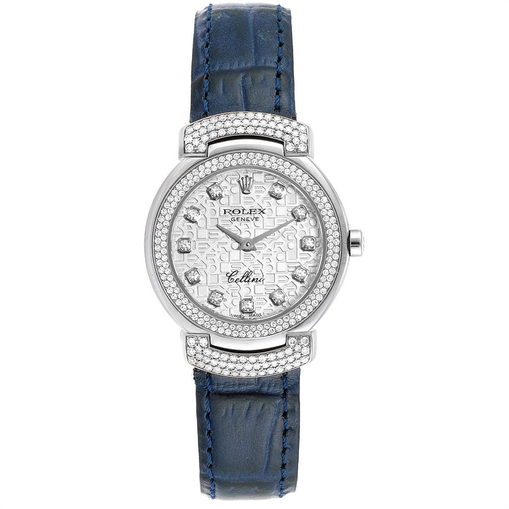The image shows a Rolex Cellini 6673 Women
s White Gold Silver Dial 6673 Women
s White Gold Silver Dial model watch from a front view, highlighting its face, bezel, and blue leather strap.