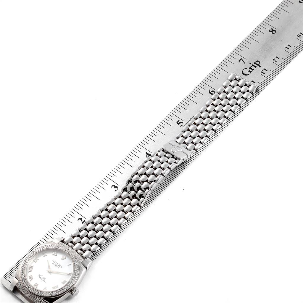 The image shows the Rolex Cellini 6321 Women's White Gold Mother of Pearl Dial 6321 Women's White Gold Mother of Pearl Dial watch at a slight angle, highlighting the face and metal bracelet with a ruler beside it.