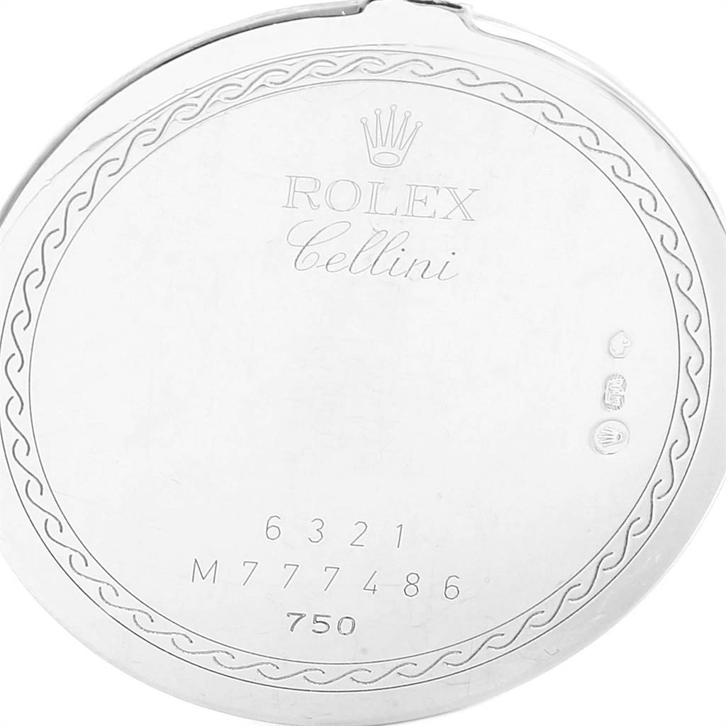 This image shows the back case of a Rolex Cellini 6321 Women's White Gold Mother of Pearl Dial 6321 Women's White Gold Mother of Pearl Dial watch, featuring engraving and hallmark details.