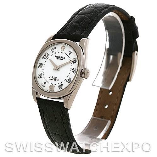 The image shows a Rolex Cellini 6229 Women's White Gold White Dial 6229 Women's White Gold White Dial watch from an angled side view, showcasing the face, bezel, crown, and leather strap.