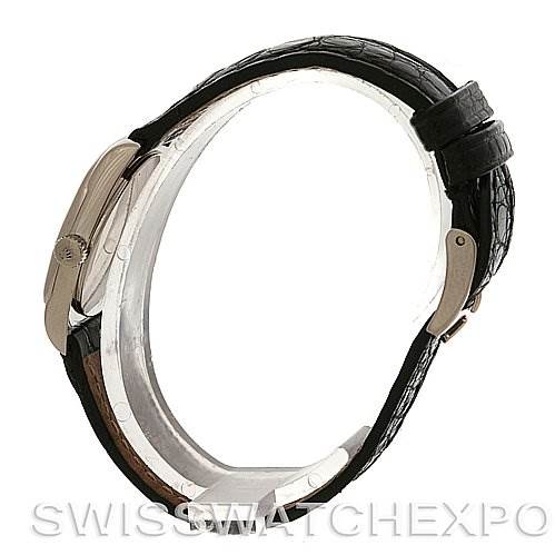 Side view of the Rolex Cellini 6229 Women's White Gold White Dial 6229 Women's White Gold White Dial watch focusing on the case, crown, and black leather strap.