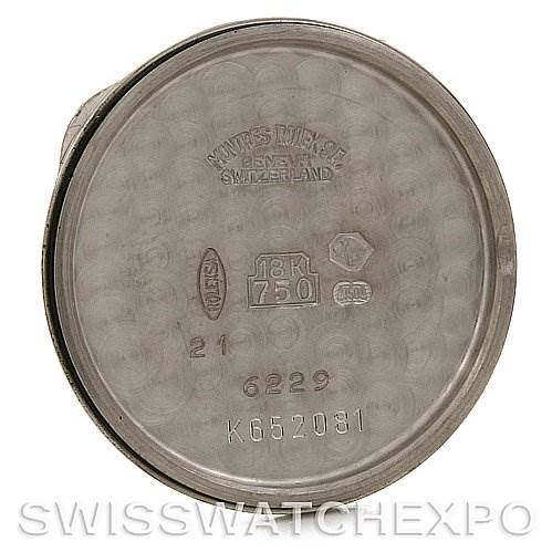 The image shows the inner case back of a Rolex Cellini 6229 Women's White Gold White Dial 6229 Women's White Gold White Dial watch with various engravings and hallmarks visible.