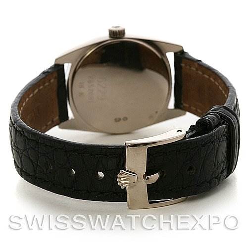 This image shows the back view of a Rolex Cellini 6229 Women's White Gold White Dial 6229 Women's White Gold White Dial watch, including the case back, crown, and leather strap with buckle.