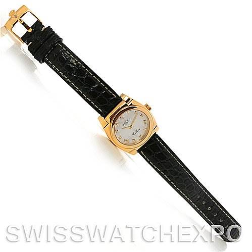 The image shows a full, top-down view of a Rolex Cellini 5310 Women's Yellow Gold Mother of Pearl Dial 5310 Women's Yellow Gold Mother of Pearl Dial watch with a black leather strap and a gold case.