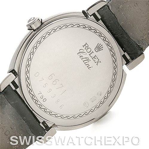 The image shows the backside of a Rolex Cellini 6671/9 Women's White Gold Silver Dial 6671/9 Women's White Gold Silver Dial watch, highlighting the case back, engraving, and part of the leather strap.