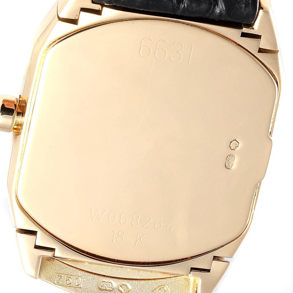 This image shows the back case of a Rolex Cellini 6691 Women's Yellow Gold White Dial 6691 Women's Yellow Gold White Dial watch, featuring its model number, serial number, and "18K" gold mark.
