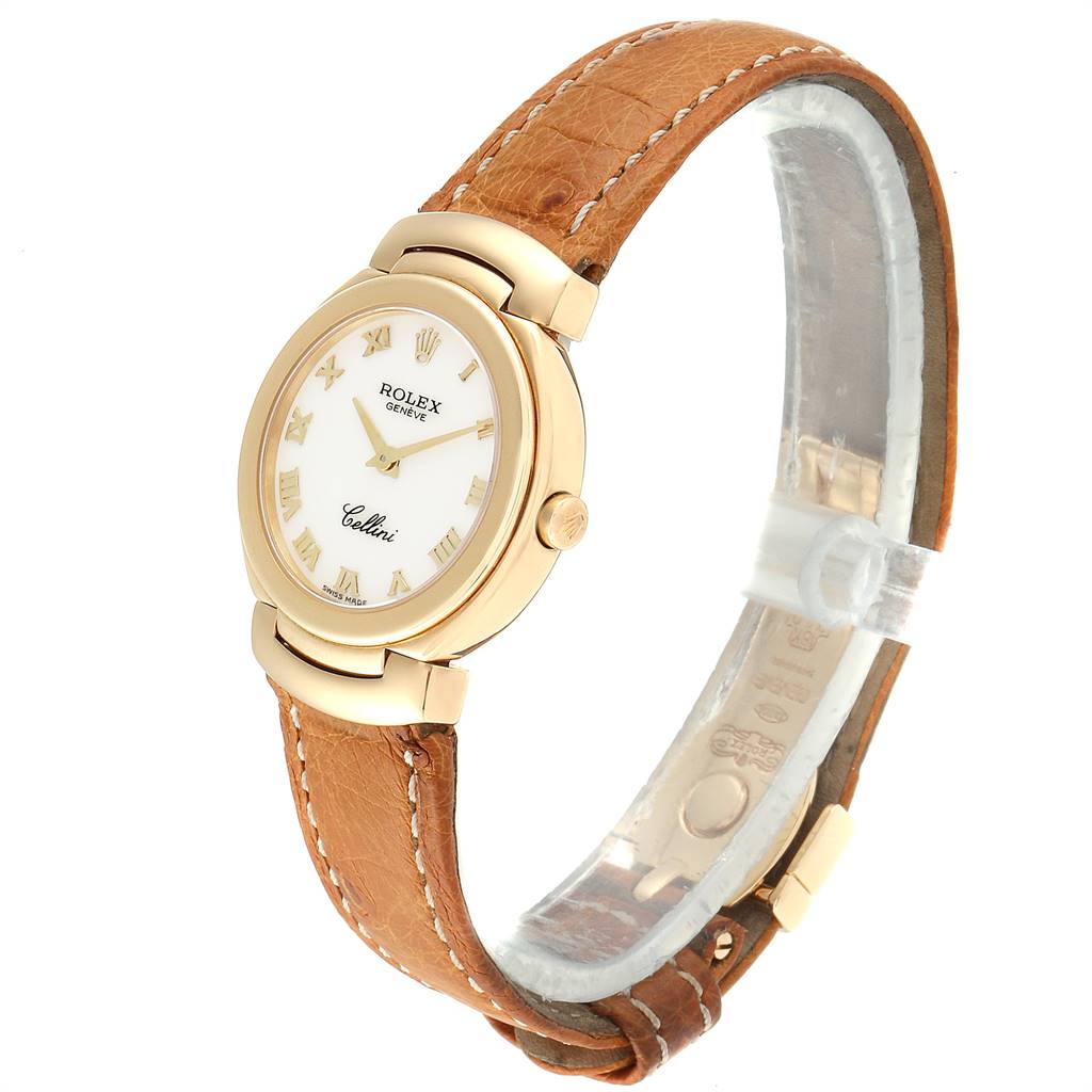 The image shows a Rolex Cellini 6621 Women's Yellow Gold White Dial 6621 Women's Yellow Gold White Dial watch at a slight angle, highlighting its round face, Roman numerals, and brown leather strap.