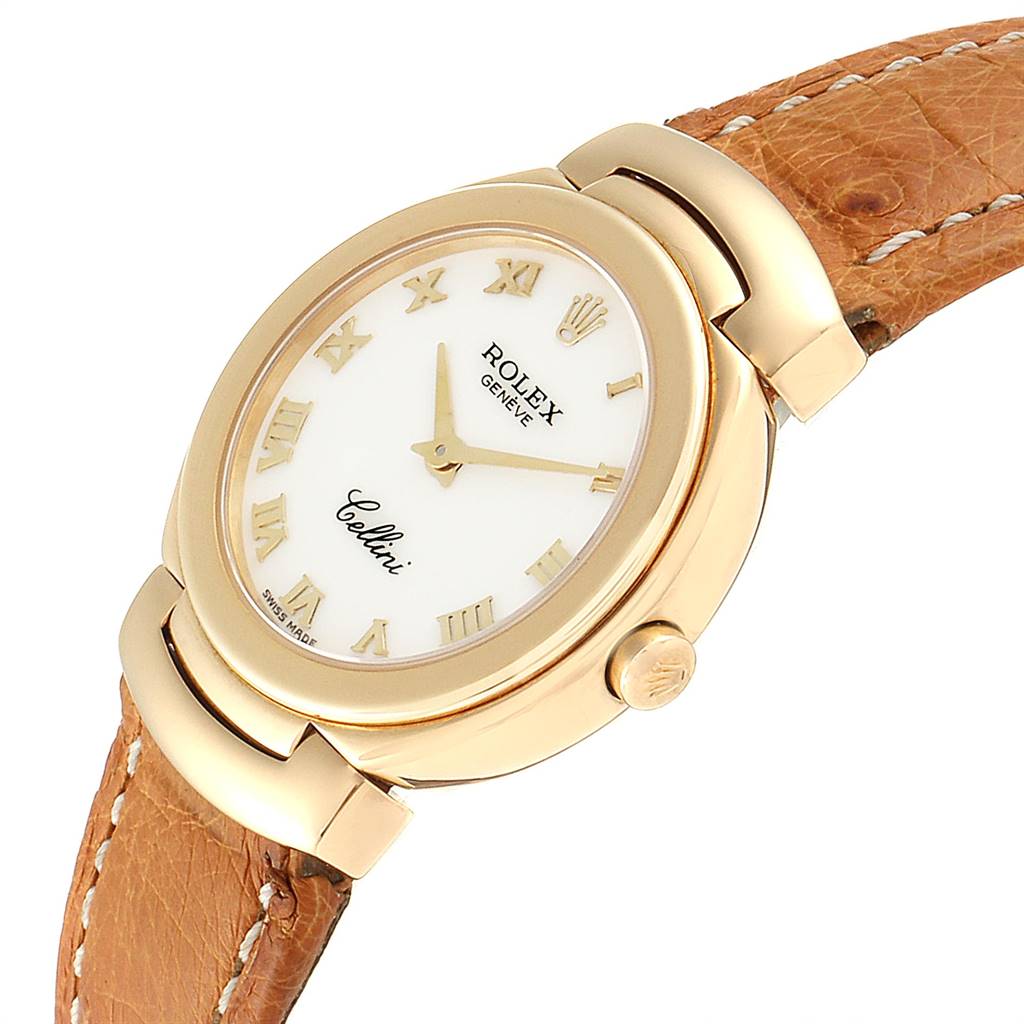 This image shows a Rolex Cellini 6621 Women's Yellow Gold White Dial 6621 Women's Yellow Gold White Dial watch from an angled view, highlighting its white dial with Roman numerals, gold case, and brown leather strap.