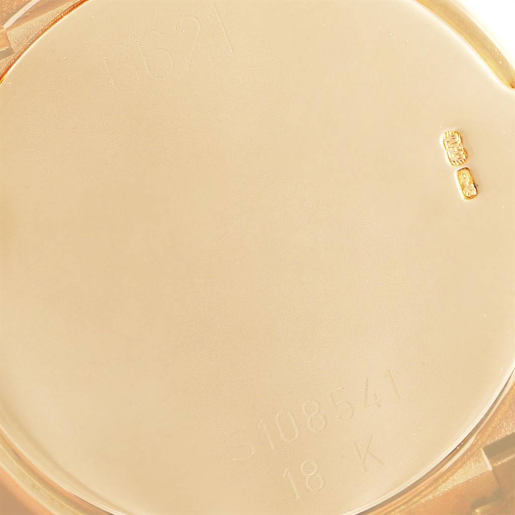 The image shows a close-up of the case back of the Rolex Cellini 6621 Women's Yellow Gold White Dial 6621 Women's Yellow Gold White Dial watch, highlighting engravings and hallmarks.