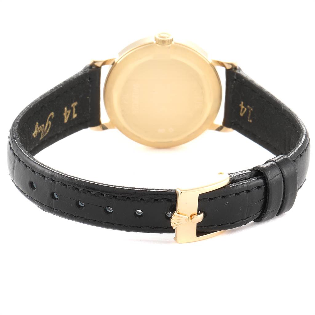 This image shows the back view of a Rolex Cellini 5109 Women's Yellow Gold Champagne Dial 5109 Women's Yellow Gold Champagne Dial watch, highlighting its gold case and black leather strap with a gold buckle.