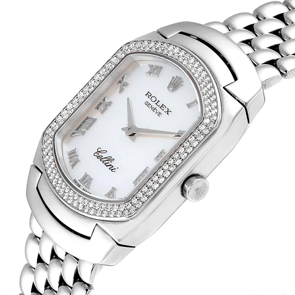 The Rolex Cellini 6691 Women's White Gold Champagne Dial 6691 Women's White Gold Champagne Dial watch is shown at an angle highlighting its oval-shaped face, diamond bezel, and partially visible bracelet.