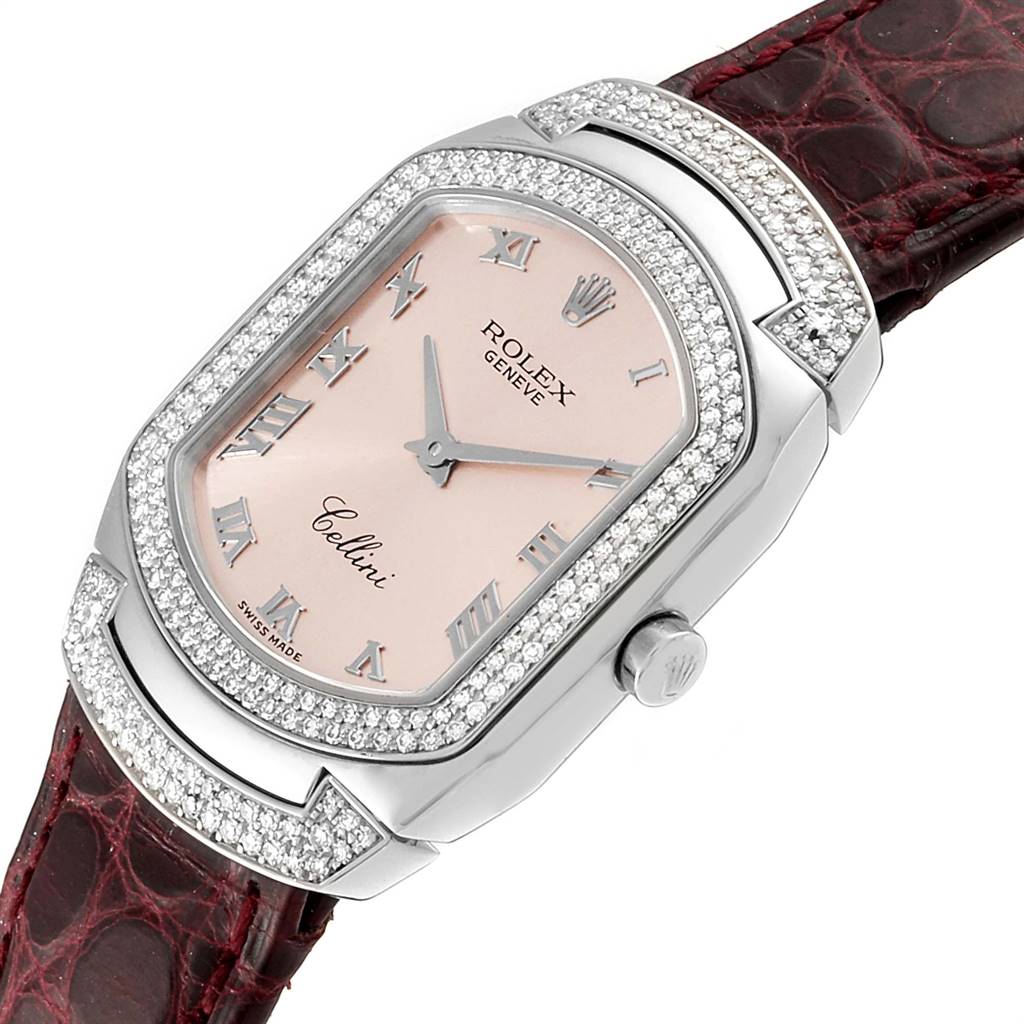 This image shows a close-up angle of a Rolex Cellini 6693 Women's White Gold Pink Dial 6693 Women's White Gold Pink Dial watch, highlighting its dial, diamond-studded bezel, and strap attachment.
