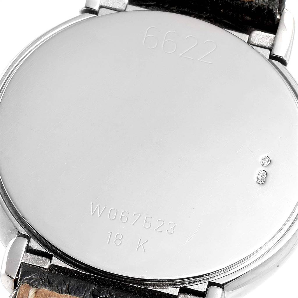 The image shows the case back of a Rolex Cellini 6622 Women's White Gold White Dial 6622 Women's White Gold White Dial model, displaying inscriptions and part of the leather strap.