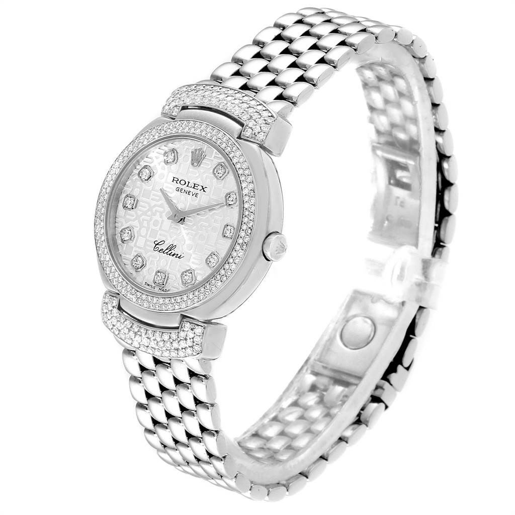 The Rolex Cellini 6673 Women
s White Gold Silver Dial 6673 Women
s White Gold Silver Dial model watch is shown at a three-quarter angle, displaying the face, bracelet, bezel, and crown.