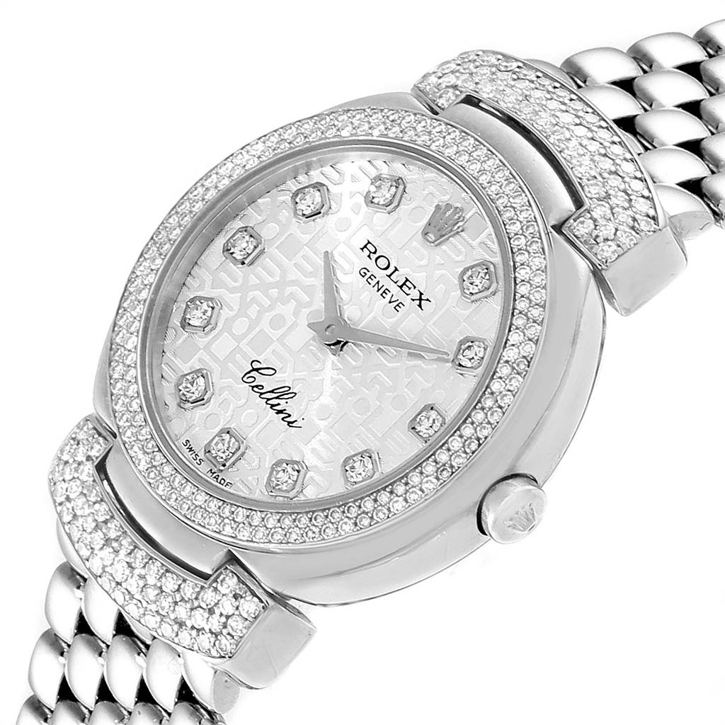 The image shows a close-up of the Rolex Cellini 6673 Women
s White Gold Silver Dial 6673 Women
s White Gold Silver Dial watch face, bezel, and part of the bracelet at an angle.