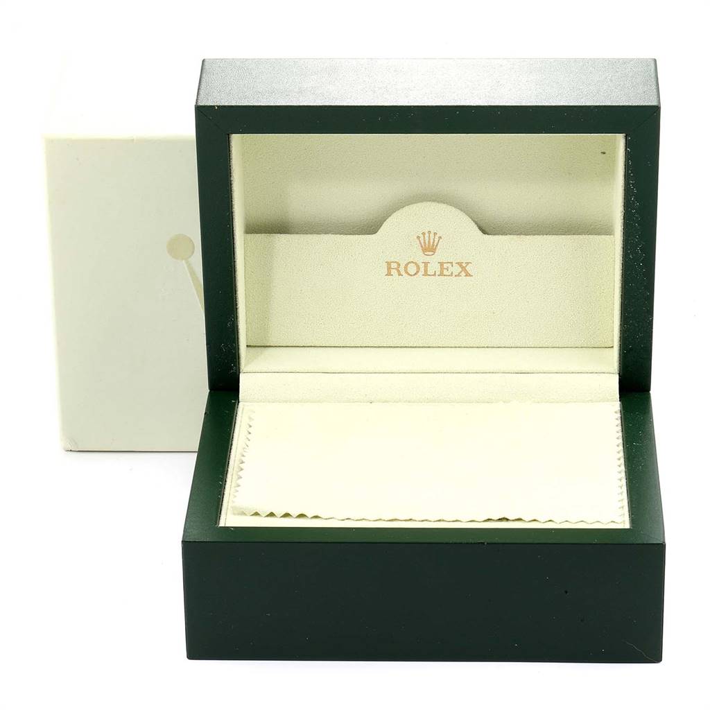The image shows an open Rolex Cellini 6673 Women
s White Gold Silver Dial 6673 Women
s White Gold Silver Dial watch box with its interior and cushion visible.