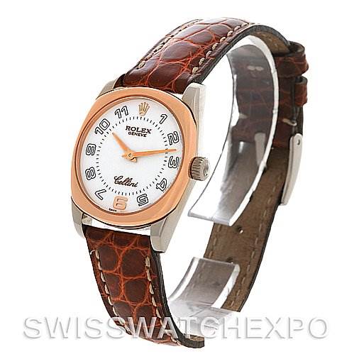 The Rolex Cellini 6229 Women's White Gold White Dial 6229 Women's White Gold White Dial watch is shown at an angled view, highlighting the dial, bezel, crown, and brown leather strap.