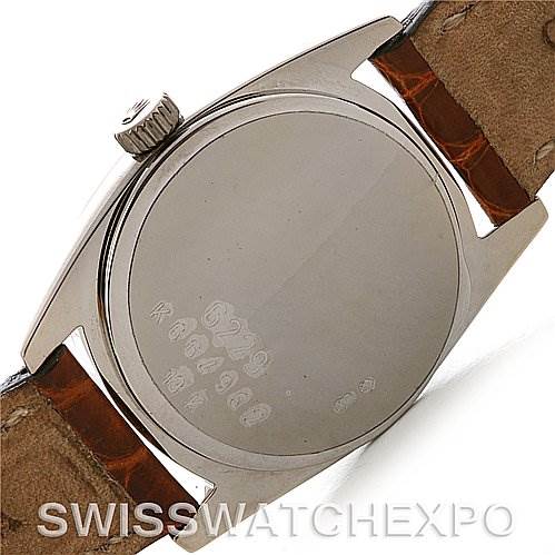 This image shows the back case and part of the strap of a Rolex Cellini 6229 Women's White Gold White Dial 6229 Women's White Gold White Dial watch, viewed from an angled rear perspective.