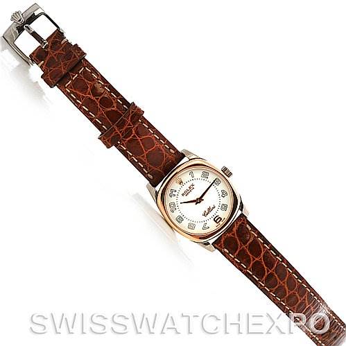 The image shows a top view of a Rolex Cellini 6229 Women's White Gold White Dial 6229 Women's White Gold White Dial watch with a brown leather strap and a rectangular dial.