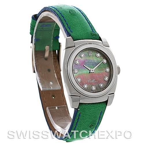 This image shows a Rolex Cellini 5310 Women's White Gold Mother of Pearl Dial 5310 Women's White Gold Mother of Pearl Dial watch at an angled view, highlighting its green strap, colorful dial, and diamond markers.