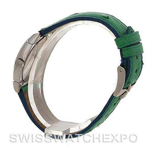 The image shows a side view of a Rolex Cellini 5310 Women's White Gold Mother of Pearl Dial 5310 Women's White Gold Mother of Pearl Dial watch, focusing on the crown, case thickness, and green leather strap.