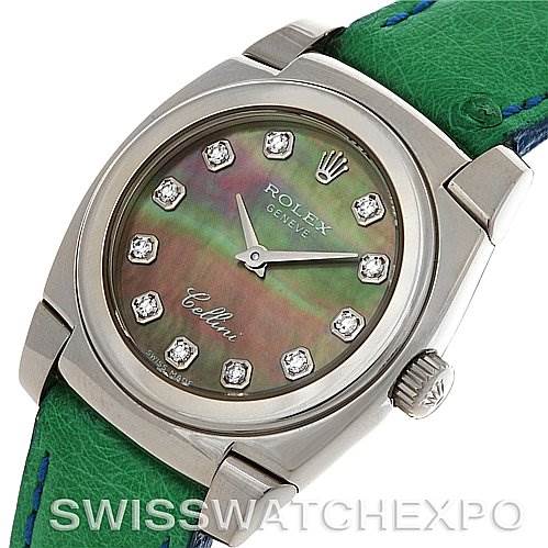 The image shows a close-up of a Rolex Cellini 5310 Women's White Gold Mother of Pearl Dial 5310 Women's White Gold Mother of Pearl Dial watch dial, bezel, crown, and green leather strap at an angled view.